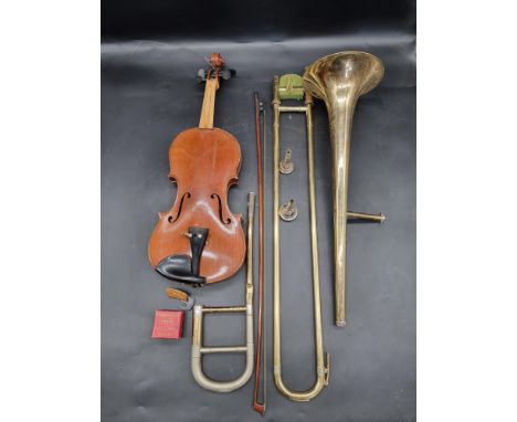 A Czechoslovakian&nbsp;clarinet in fitted case;&nbsp;together with a trombone, in case; and a violin, in case. (3) 