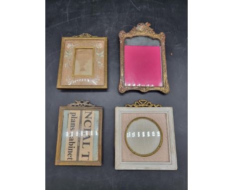 A small cast copper easel back frame, 19.5 x 12.5cm; together with three further small frames. (4) 