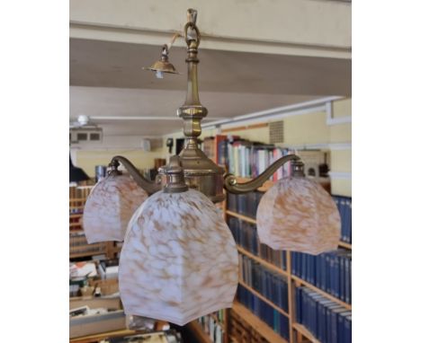 A brass three branch ceiling light, with marbled glass shades, approx 52.5cm diameter. 