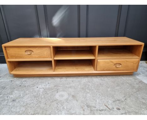 An Ercol television or media stand, 155cm wide. 