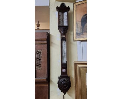 A Victorian Scottish carved oak stick barometer, by J White, Glasgow, 104cm high, (s.d.).&nbsp;&nbsp; 