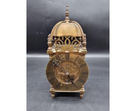 A brass lantern style clock,&nbsp;the dial inscribed 'Hampton &amp; Sons Ltd, Pall Mall East', the movement inscribed 'Astral