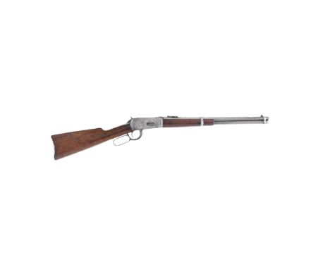 A .30 (W.C.F.) 'Model 1894' lever-action saddle-ring carbine by Winchester, no. 648959The receiver, hammer and lever retainin