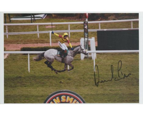 Martin Pipe Jockey Signed 6 x 4 photo. Photo shows Pipe riding his horse in the races. All autographed items come with a Cert