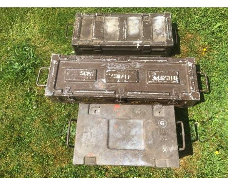 Three ammunition cases.