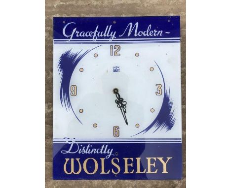 A Wolseley Sectric perspex showroom wall clock, 11 x 14".
