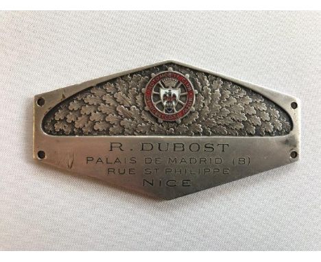 An Automobile Club of Nice et Cote Azur dash plaque marked R. Dubost Palais de Madrid, Rue St. Phillipe, Nice, by repute silv