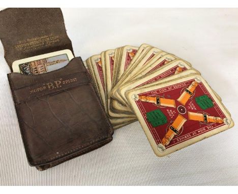 A Pratt's Perfection Motor Spirit group of playing cards and a BP branded leather case.