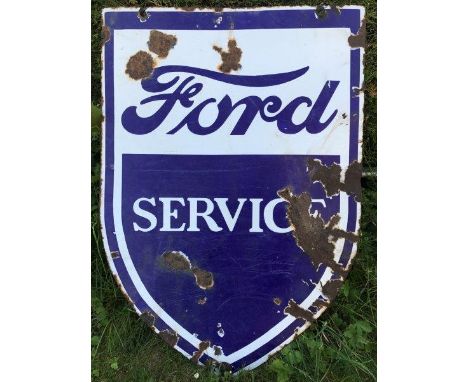 A Ford Service shield shaped double sided enamel sign, 23 3/4 x 33".