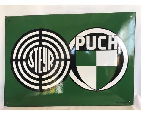 A German rectangular enamel sign advertising Steyre and Puch, in very good condition, 30 3/4 x 21 3/4".