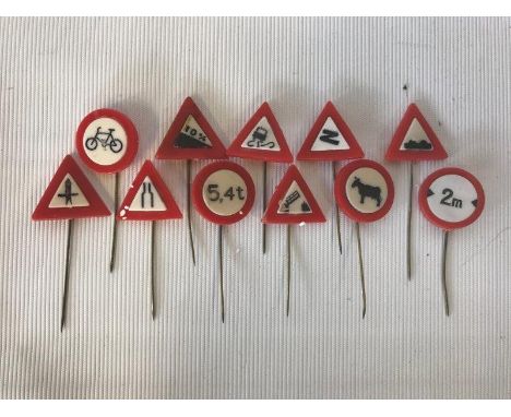 A selection of miniature 'road sign' stick pins.