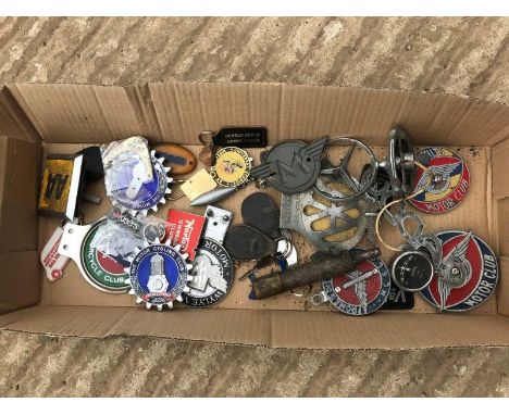A quantity of assorted motorcycling related badges, keyrings etc. to include two Motorcycling Club enamel badges.