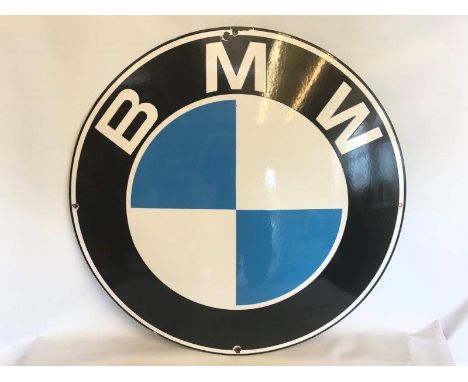 A reproduction BMW convex enamel sign, 23 3/4" diameter.