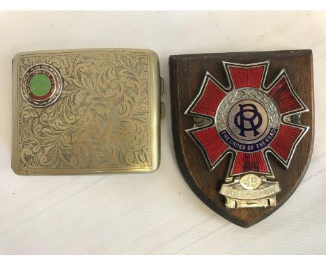 An Order of The Road part enamel badge, wooden base mounted and a silver plated cigarette case bearing a plaque for the Brist