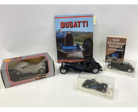 A quantity of Bugatti Royale and Atlantic models and two related books including a Franklin Mint 1:24 scale model and a 1:34 