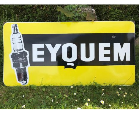 An Eyquem part pictorial spark plugs enamel sign, 38 3/4 x 18 3/4".