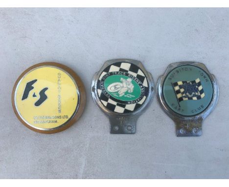 An enamel badge - Fattorini and Sons Limited, Birmingham and two others.