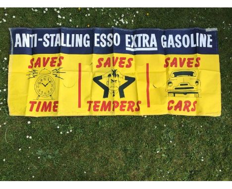 An unusual Esso banner - 'Anti-stalling Esso Extra Gasoline Saves Time, Saves Tempers, Save Cars', 80 1/2 x 33 1/4".