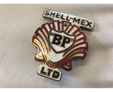 A Shell-Mex and BP Limited part enamel cap badge. 