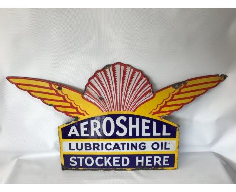 An Aeroshell Lubricating Oils Stocked Here double sided shaped enamel sign in good original condition, 28 x 15".