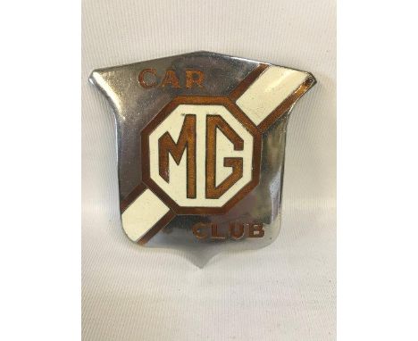 An MG Car Club part enamel badge.