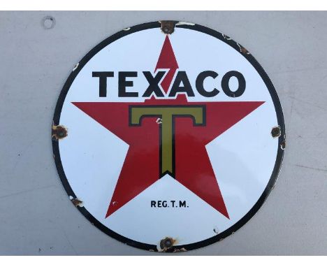 A decorative Texaco circular enamel sign of more recent manufacture, 11 3/4" diameter.