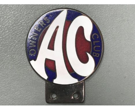 A reproduction AC Owner's Club enamel car badge.