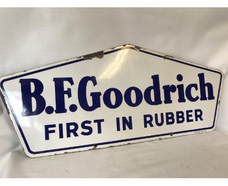 A BF Goodrich 'First in Rubber' shaped enamel sign, 33 x 13 3/4".