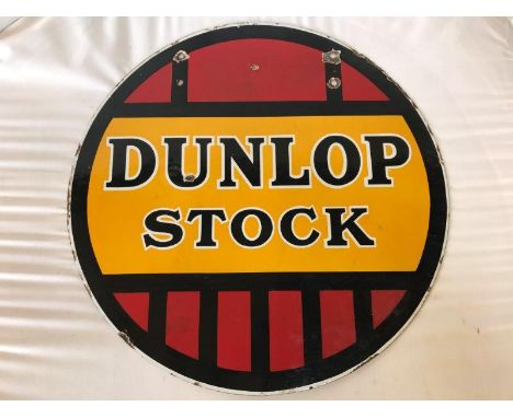 A Dunlop Stock circular double sided enamel sign, 18" diameter.