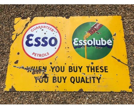 A large Esso and Essolube rectangular enamel sign 'When you buy these you buy quality', dated 1935, 72 x 48".