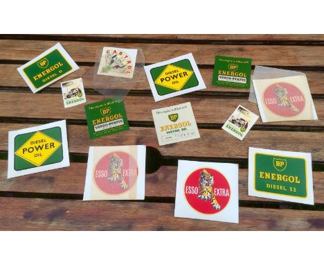 A selection of vintage motoring transfer stickers including BP Energol, Castrol and Esso.