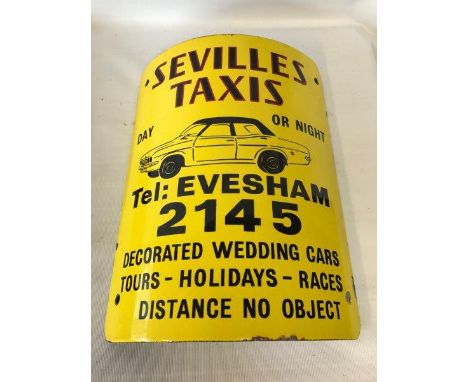 A Sevilles Taxi of Evesham curved enamel post sign, approximately 10 1/4 x 12".