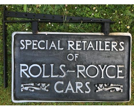 An unusual Rolls-Royce cast retailer sign with bracket, 27 1/2 x 21" overall.