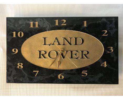 A Land-Rover ceramic rectangular garage clock, 13 x 8".