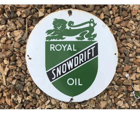 A Royal Snowdrift Oil circular oil cabinet enamel sign, 12" diameter. 