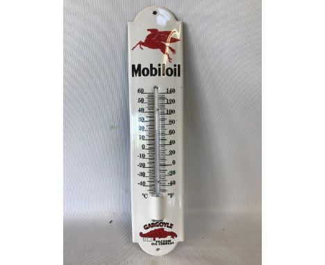 A reproduction Mobiloil enamel thermometer.