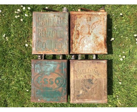 Four two gallon petrol cans to include Shell and Esso. 