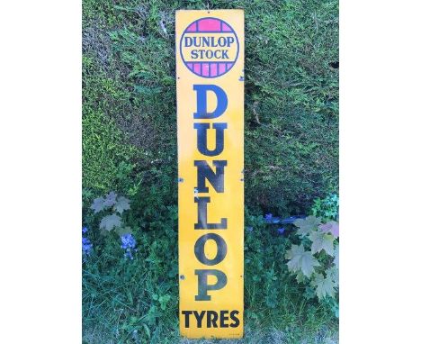 A Dunlop Stock Tyres narrow rectangular enamel sign in very good condition, 12 x 60".