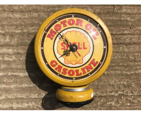 A Shell Motor Oil/Gasoline decorative globe shaped clock.