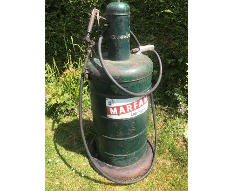 A Marfak Lubritection forecourt greaser with Caltex and Regent branded curved enamel sign to the front. 