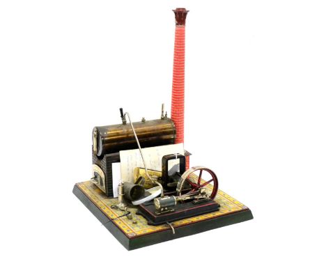 Bing Live Steam Stationary Engine consisting of horizontal boiler mounted on base impressed with brick effect and bearing GBN