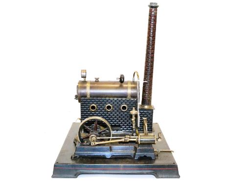 Doll Live Steam Stationary Engine consisting of horizontal boiler  mounted on brick effect stand with chimney, connected to s