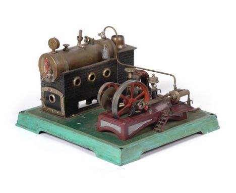 Doll Live Steam Stationary Engine consisting of horizontal boiler mounted on brick effect base and chimney base (lacks chimne