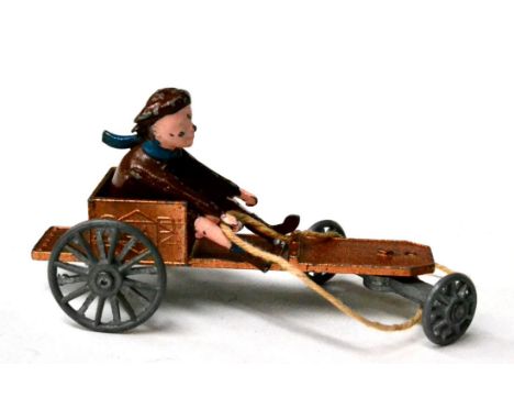 Lesney Soap Box Racer with bronze cart with ''Soap'' in proud lettering on one side and ''Soda'' on the other, with seated bo