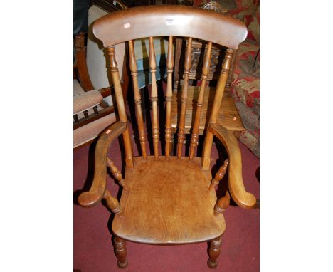 An early 20th century elm and beech stick back farmhouse open armchair, width 63cm, together with a Victorian mahogany and re