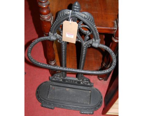 A Victorian style black painted cast iron stick stand