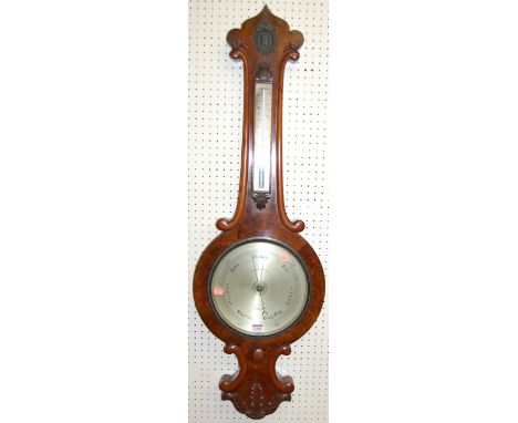 A mid-Victorian figured walnut two-dial wheel barometer, the silvered dial signed John Walker, 86 Strand, London with raised 