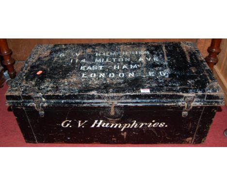 An early 20th century painted metal hinge top travelling trunk, width 79cm