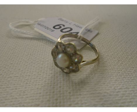 WHITE GOLD 9CT ENGAGEMENT RING WITH 'PEARL' SURROUNDED WITH 7 DIAMONDS? GROSS 3.3g