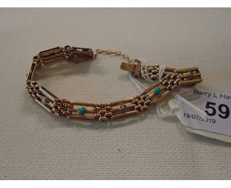 GOLD GATE BRACELET MARKED 9CT WITH ALTERNATE TURQOUISE? OPEL? STONES GROSS 15g